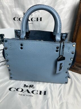 Coach 1941 Rogue 24 in Slate Blue w/ Rivets